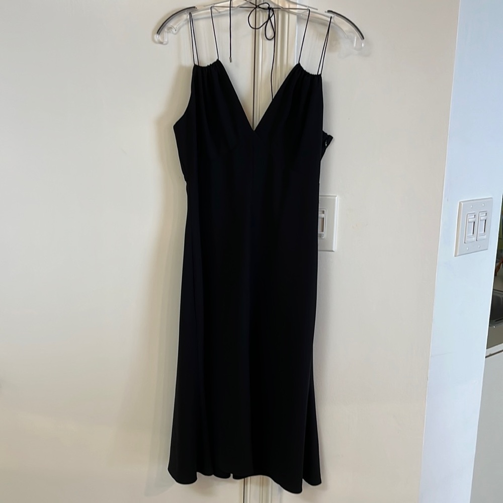 Black strapped dress size 2/4